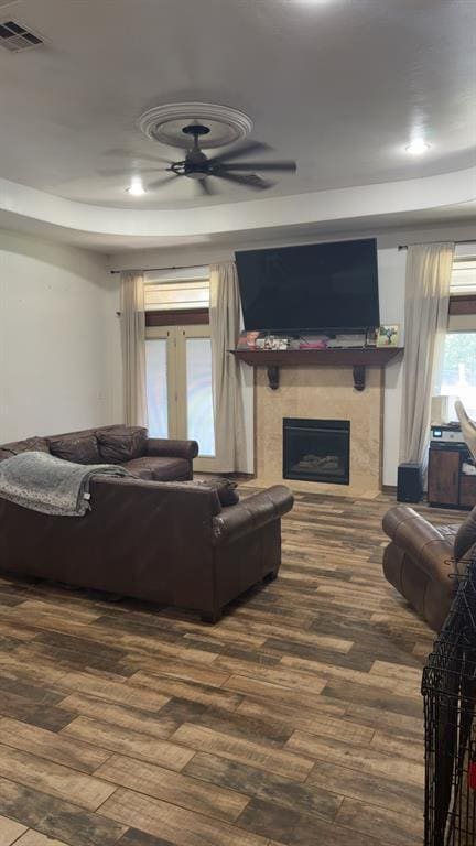928 County St Unit 2932, Tuttle, OK 73089 - living room featuring a ceiling fan, hardwood / wood-style flooring, a fireplace, and recessed lighting
