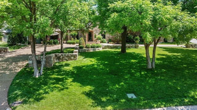 6638 Avondale Dr, Nichols Hills, OK 73116 - view of home's community featuring a lawn