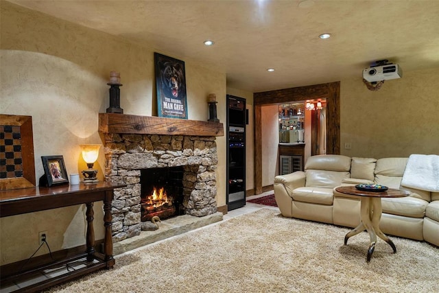 6638 Avondale Dr, Nichols Hills, OK 73116 - living room with a fireplace, recessed lighting, and carpet floors