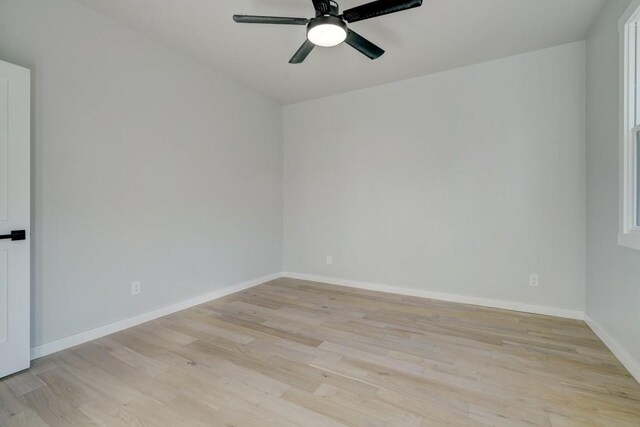 108 NW 25th St, Oklahoma City, OK 73103 - unfurnished room featuring light wood finished floors, ceiling fan, and baseboards