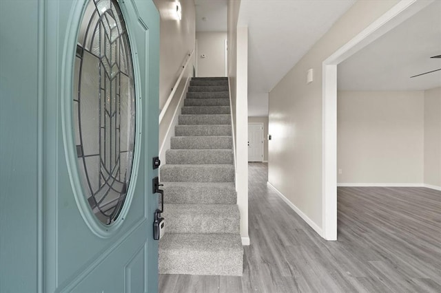 7 Concord Blvd, Shawnee, OK 74804 - foyer with wood finished floors, stairway, and baseboards