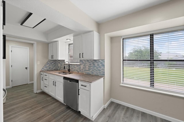 7 Concord Blvd, Shawnee, OK 74804 - kitchen with stainless steel dishwasher, a sink, and plenty of natural light