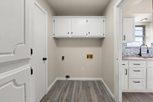 7 Concord Blvd, Shawnee, OK 74804 - washroom featuring electric dryer hookup, dark wood-style flooring, hookup for a washing machine, and baseboards