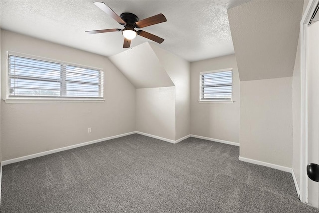 7 Concord Blvd, Shawnee, OK 74804 - bonus room with carpet, vaulted ceiling, ceiling fan, a textured ceiling, and baseboards