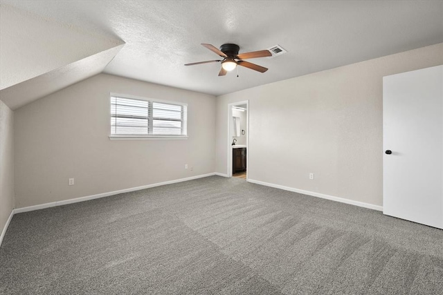 7 Concord Blvd, Shawnee, OK 74804 - bonus room with ceiling fan, carpet, baseboards, and a textured ceiling