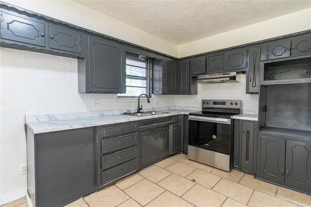 1524 Hampton Dr, Del City, OK 73115 - kitchen featuring stainless steel range with electric stovetop, a sink, under cabinet range hood, decorative backsplash, and a textured ceiling
