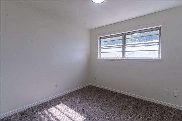 1524 Hampton Dr, Del City, OK 73115 - spare room featuring carpet floors and baseboards