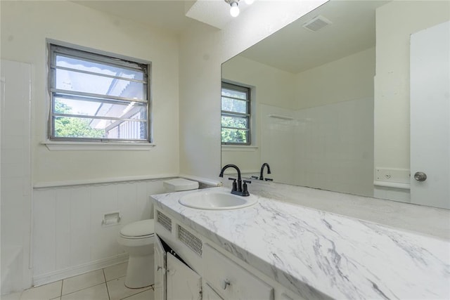 1524 Hampton Dr, Del City, OK 73115 - bathroom with wainscoting, vanity, toilet, a shower, and tile patterned flooring
