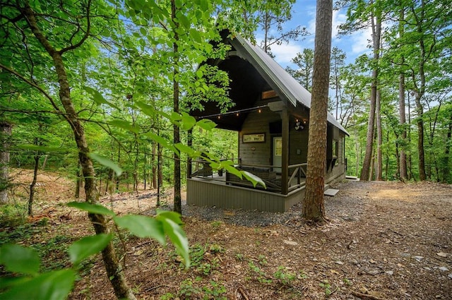 21 Sherwood Forest Ln, Broken Bow, OK 74728 - view of property exterior featuring metal roof