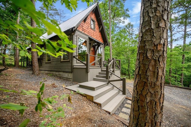21 Sherwood Forest Ln, Broken Bow, OK 74728 - view of property exterior with metal roof