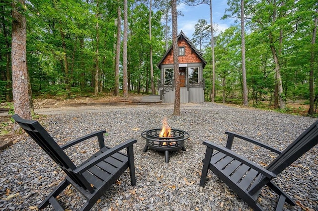 21 Sherwood Forest Ln, Broken Bow, OK 74728 - view of home's community featuring a fire pit