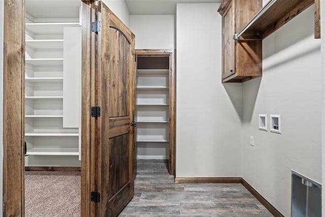 2414 Black Jack Way, Blanchard, OK 73010 - washroom featuring cabinet space, wood finished floors, hookup for a washing machine, and baseboards