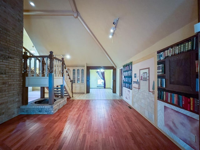 2010 Saddleback Blvd, Norman, OK 73072 - entrance foyer with stairs, high vaulted ceiling, wood finished floors, and beamed ceiling