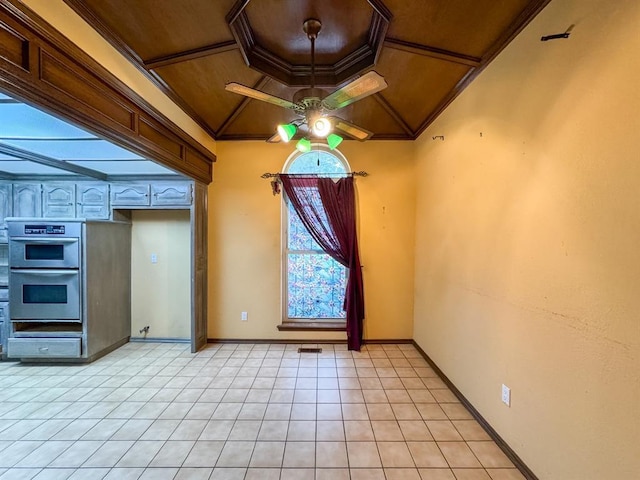 2010 Saddleback Blvd, Norman, OK 73072 - spare room featuring wood ceiling, ceiling fan, light tile patterned floors, and lofted ceiling
