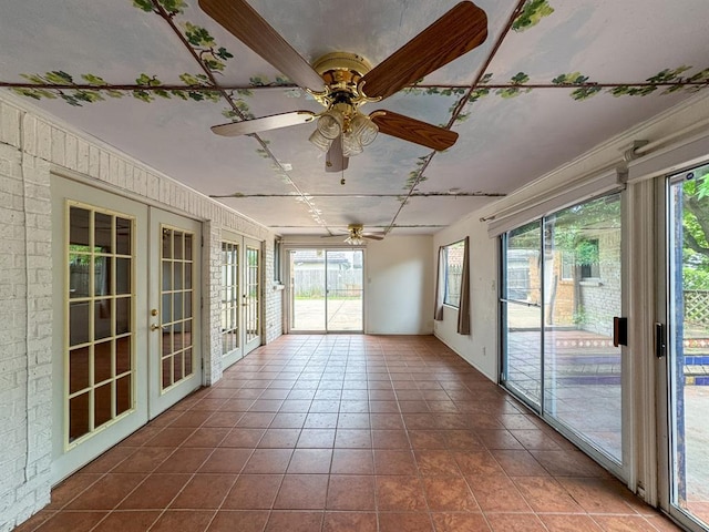 2010 Saddleback Blvd, Norman, OK 73072 - unfurnished sunroom with french doors, crown molding, and tile patterned floors