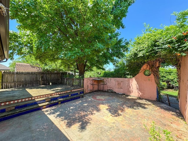 2010 Saddleback Blvd, Norman, OK 73072 - view of patio / terrace featuring a wooden deck