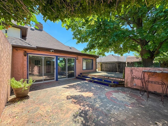 2010 Saddleback Blvd, Norman, OK 73072 - fenced backyard featuring a patio area