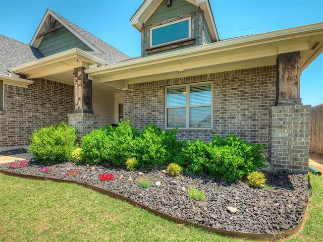 16112 Buffalo Dr, Oklahoma City, OK 73170 - entrance to property featuring brick siding and a shingled roof