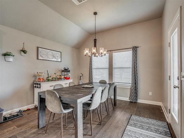 16112 Buffalo Dr, Oklahoma City, OK 73170 - dining area with a chandelier, plenty of natural light, baseboards, and vaulted ceiling