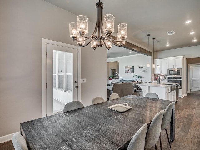 16112 Buffalo Dr, Oklahoma City, OK 73170 - dining space with a chandelier, dark wood-style flooring, and recessed lighting