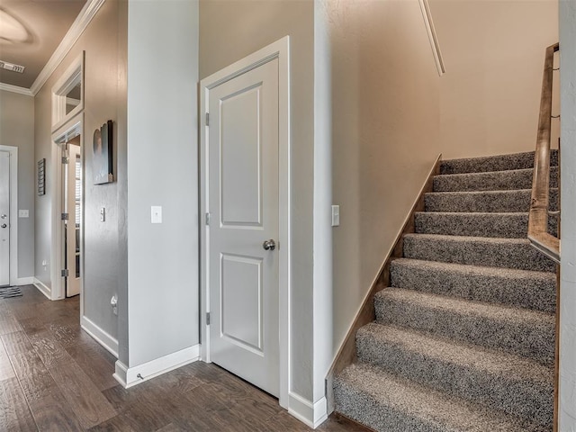 16112 Buffalo Dr, Oklahoma City, OK 73170 - stairs with wood finished floors, crown molding, and baseboards
