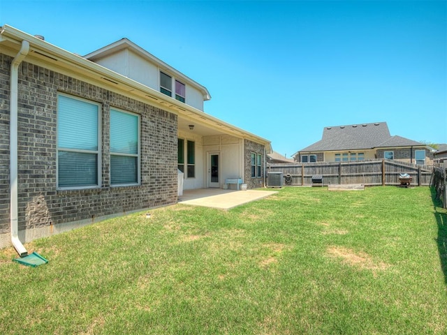 16112 Buffalo Dr, Oklahoma City, OK 73170 - view of yard featuring central air condition unit and a patio