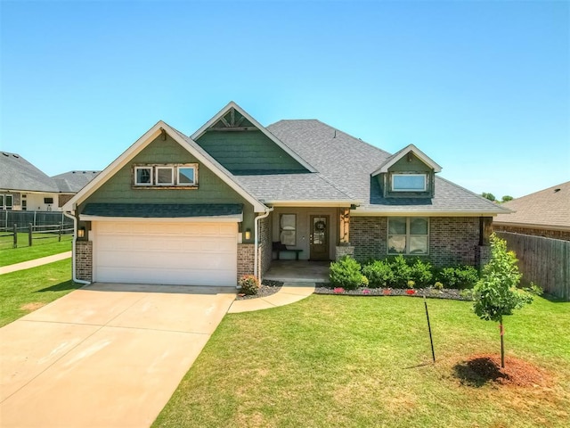 16112 Buffalo Dr, Oklahoma City, OK 73170 - craftsman-style house featuring brick siding, concrete driveway, and roof with shingles