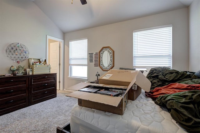 1301 Harvest Trl, Yukon, OK 73099 - bedroom with light carpet, lofted ceiling, and ceiling fan