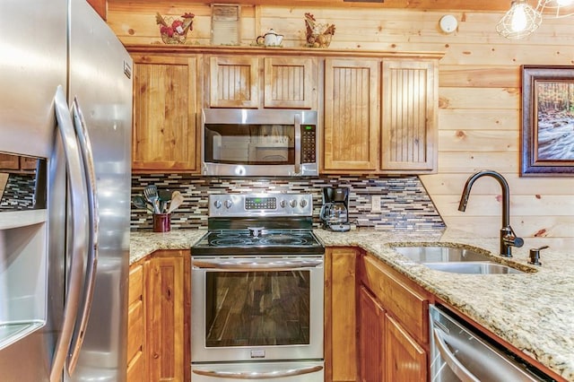 26 Huckleberry Trl, Broken Bow, OK 74728 - kitchen featuring stainless steel appliances, a sink, decorative backsplash, and light stone countertops