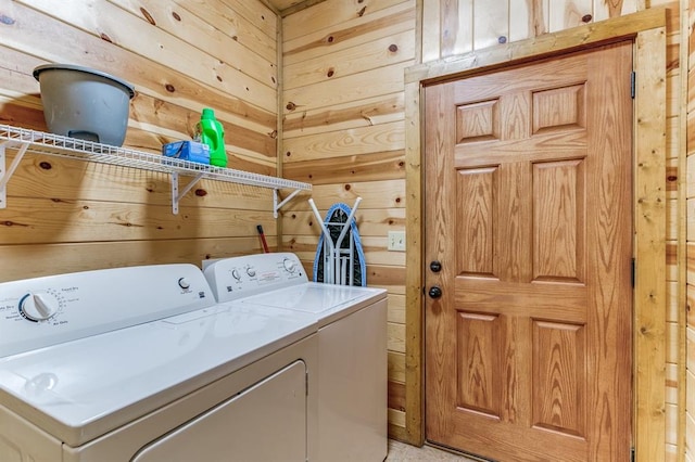 26 Huckleberry Trl, Broken Bow, OK 74728 - laundry room featuring washing machine and dryer and wood walls