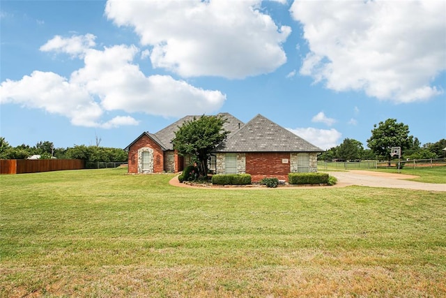 1329 S Southersby Dr, Mustang, OK 73064 - view of front of home featuring brick siding