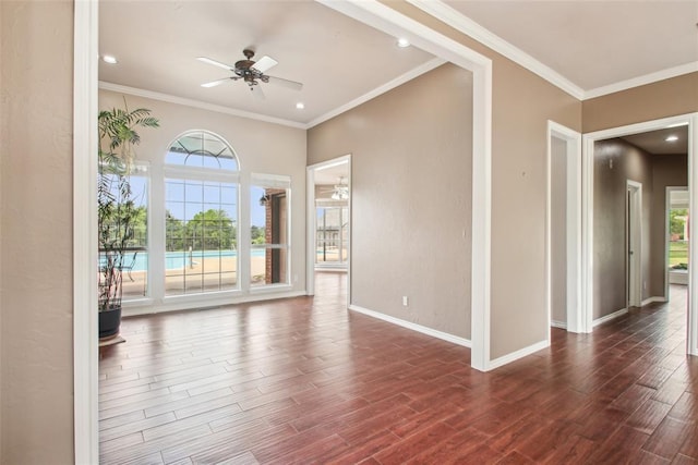 1329 S Southersby Dr, Mustang, OK 73064 - unfurnished room with a ceiling fan, healthy amount of natural light, wood finished floors, baseboards, and recessed lighting