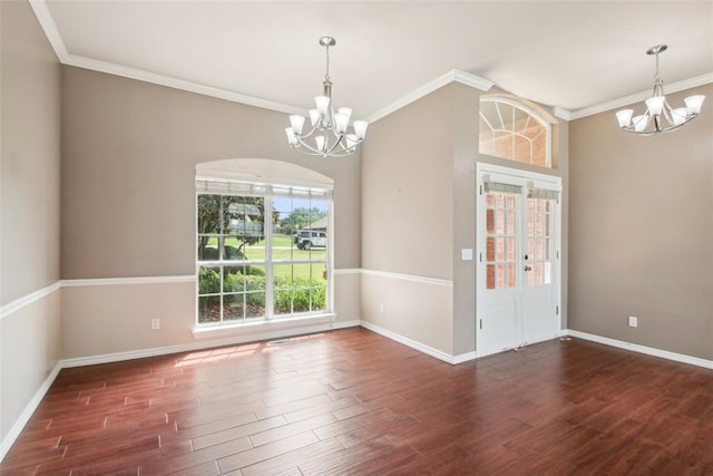 1329 S Southersby Dr, Mustang, OK 73064 - empty room featuring a chandelier, ornamental molding, wood finished floors, and baseboards