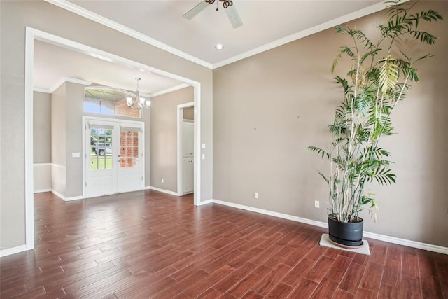 1329 S Southersby Dr, Mustang, OK 73064 - unfurnished room with dark wood finished floors, baseboards, ornamental molding, a chandelier, and a ceiling fan