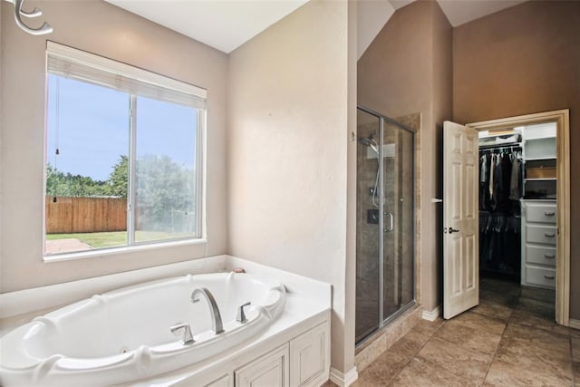 1329 S Southersby Dr, Mustang, OK 73064 - full bath with a jetted tub, a shower stall, and a walk in closet