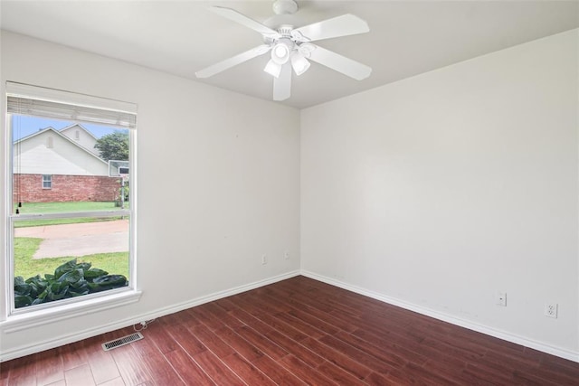 1329 S Southersby Dr, Mustang, OK 73064 - empty room with wood finished floors, baseboards, and ceiling fan