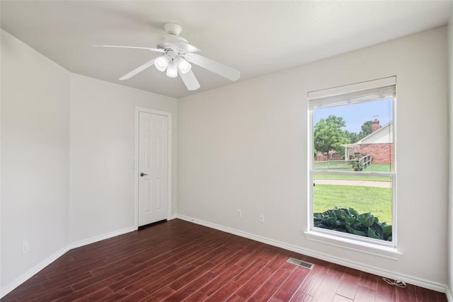 1329 S Southersby Dr, Mustang, OK 73064 - empty room with wood finished floors, baseboards, and ceiling fan