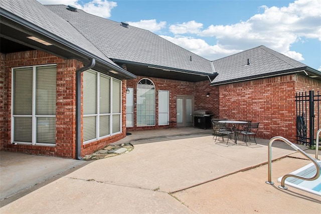 1329 S Southersby Dr, Mustang, OK 73064 - view of patio with grilling area and outdoor dining space