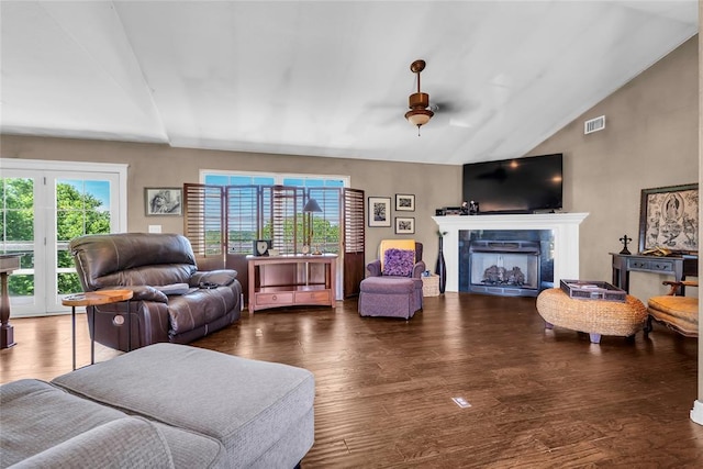 68 Ridgeview Rd, Ardmore, OK 73401 - living area with vaulted ceiling, wood finished floors, and a fireplace