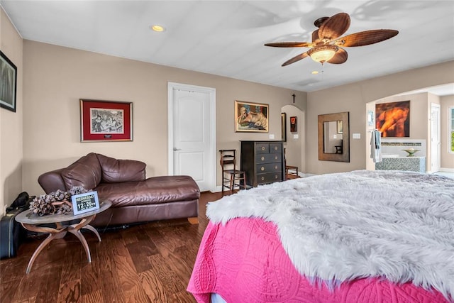 68 Ridgeview Rd, Ardmore, OK 73401 - bedroom featuring wood finished floors, recessed lighting, arched walkways, and a ceiling fan