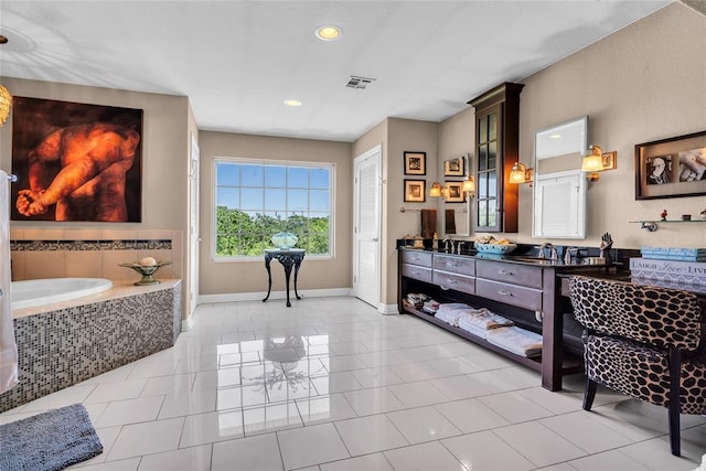68 Ridgeview Rd, Ardmore, OK 73401 - full bathroom with a garden tub, double vanity, baseboards, tile patterned floors, and recessed lighting