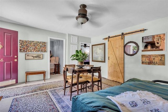 68 Ridgeview Rd, Ardmore, OK 73401 - dining space featuring ceiling fan and a barn door
