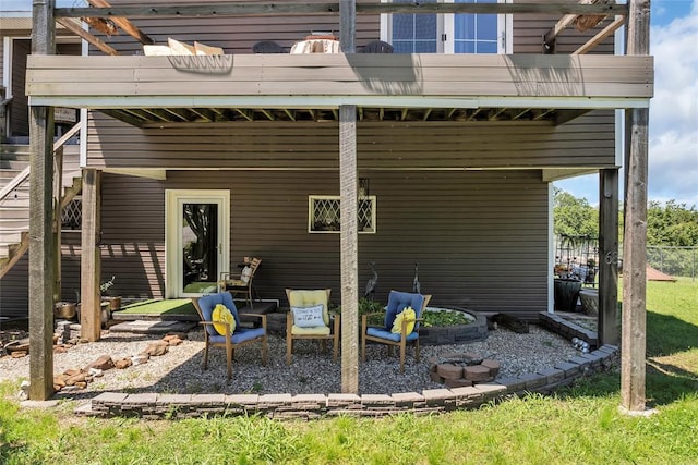 68 Ridgeview Rd, Ardmore, OK 73401 - back of house featuring a balcony and a patio