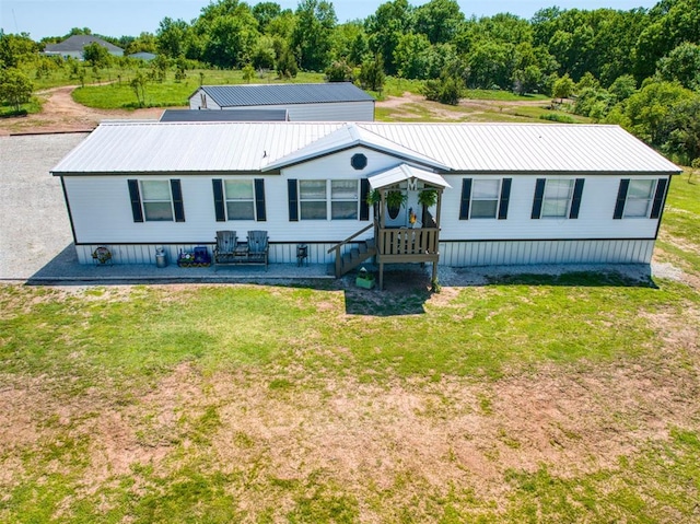 15026 N County Road 3370th Rd, Stratford, OK 74872 - back of property with a lawn and metal roof