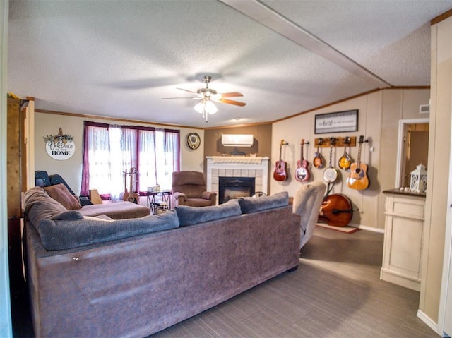 15026 N County Road 3370th Rd, Stratford, OK 74872 - living area featuring a tiled fireplace, ceiling fan, crown molding, a textured ceiling, and lofted ceiling