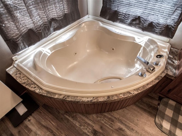 15026 N County Road 3370th Rd, Stratford, OK 74872 - full bathroom with wood finished floors and a tub with jets