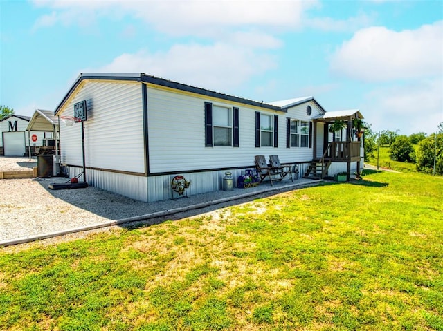 15026 N County Road 3370th Rd, Stratford, OK 74872 - view of side of home featuring a lawn and a patio