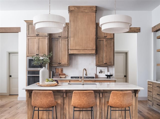 9117 SW 90th St, Mustang, OK 73064 - kitchen featuring stainless steel appliances, backsplash, light wood finished floors, and baseboards
