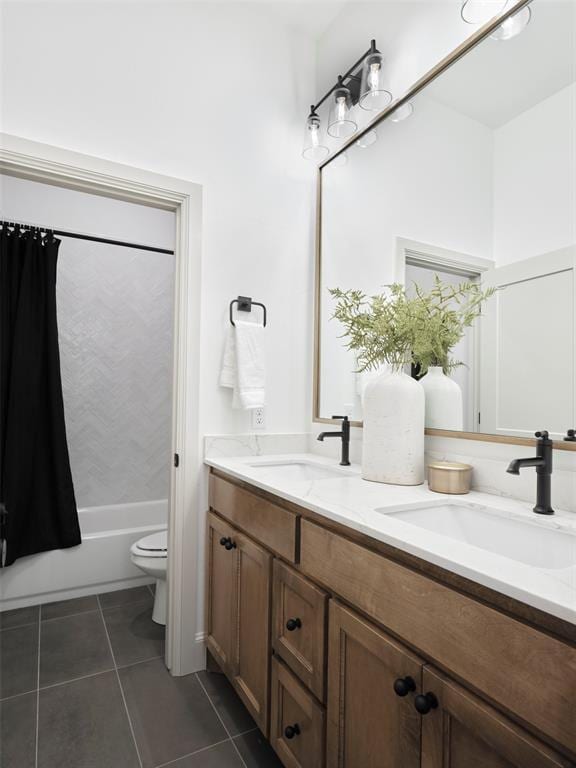 9117 SW 90th St, Mustang, OK 73064 - bathroom with tile patterned floors, toilet, double vanity, and shower / bath combination with curtain