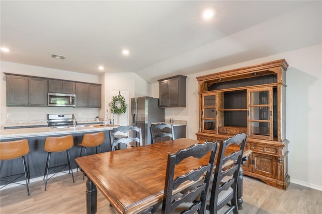 3429 Molly Dr, Yukon, OK 73099 - dining area featuring light wood-style flooring, recessed lighting, and baseboards